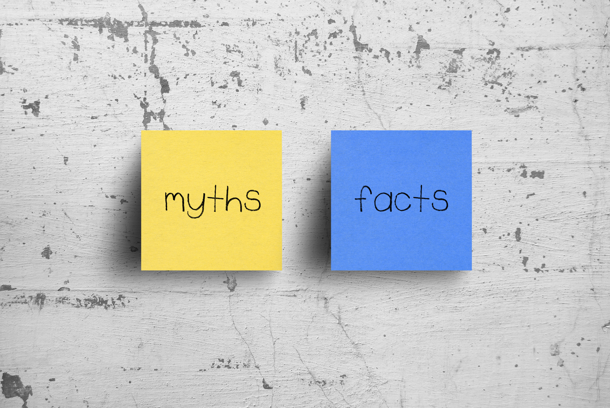 Yellow and blue sticky notes with "Myths" and "Facts" written on them. Myths vs Facts about Social Security Disability benefits.